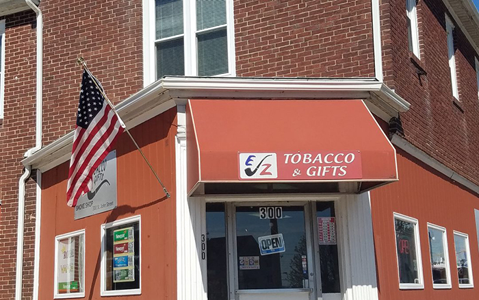 Orange tobacco shop storefront.